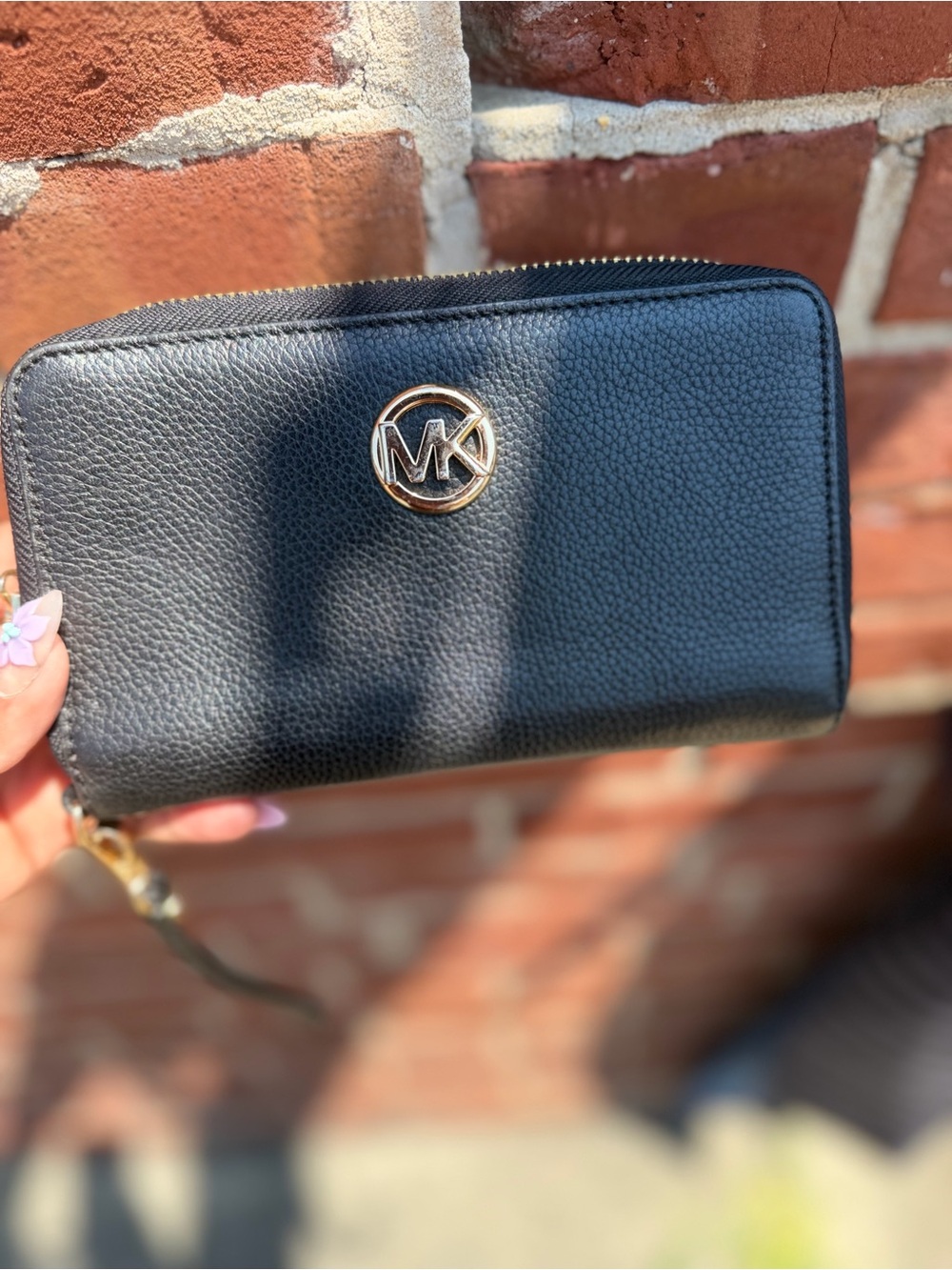 Michael Kors Black Pebbled Leather Zip-Around Wallet with Gold MK Emblem